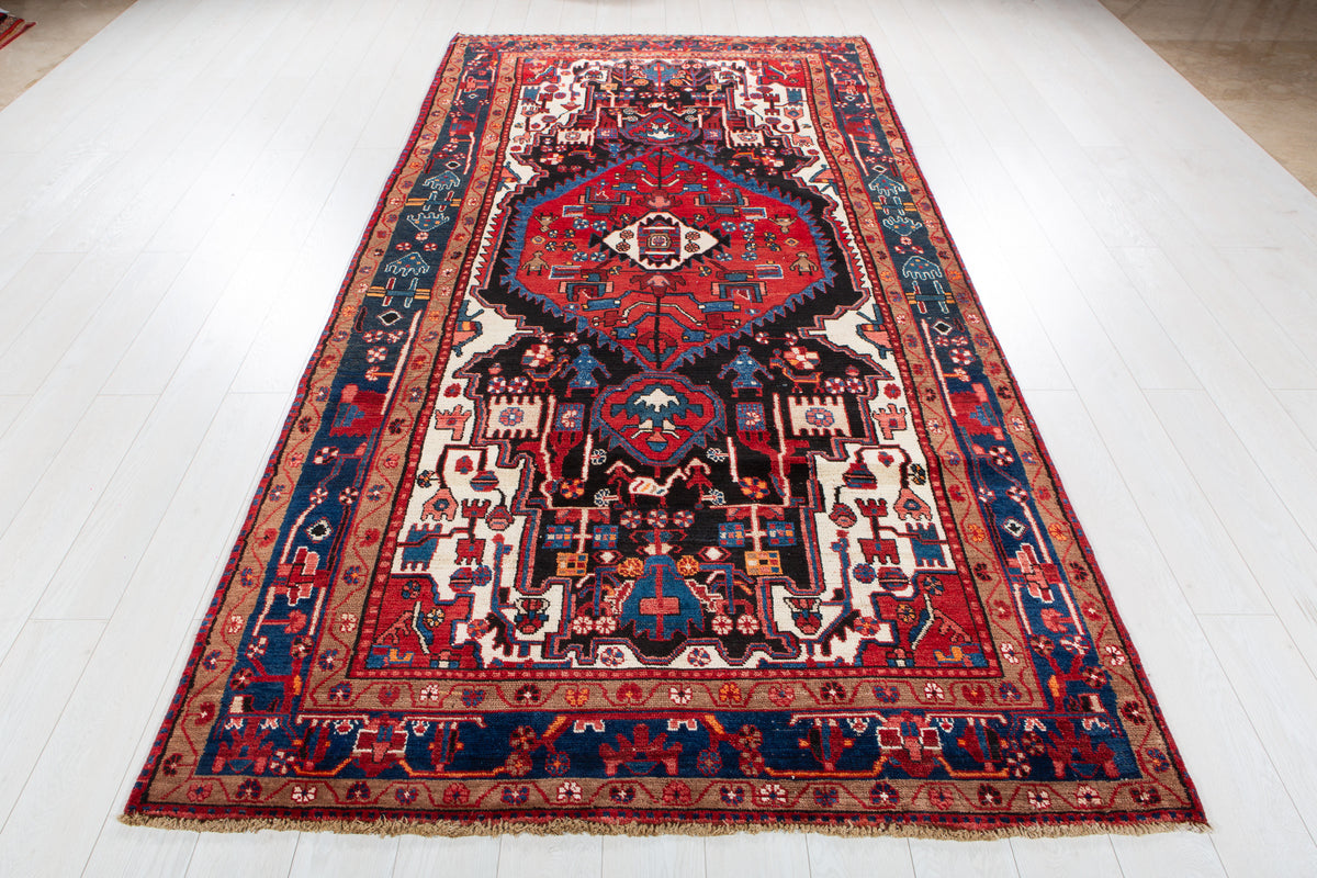 Antique Navy Blue & Red Geometric Medallion Wool Rug – 10' 5" x 5' 3" (317 x 161 cm)