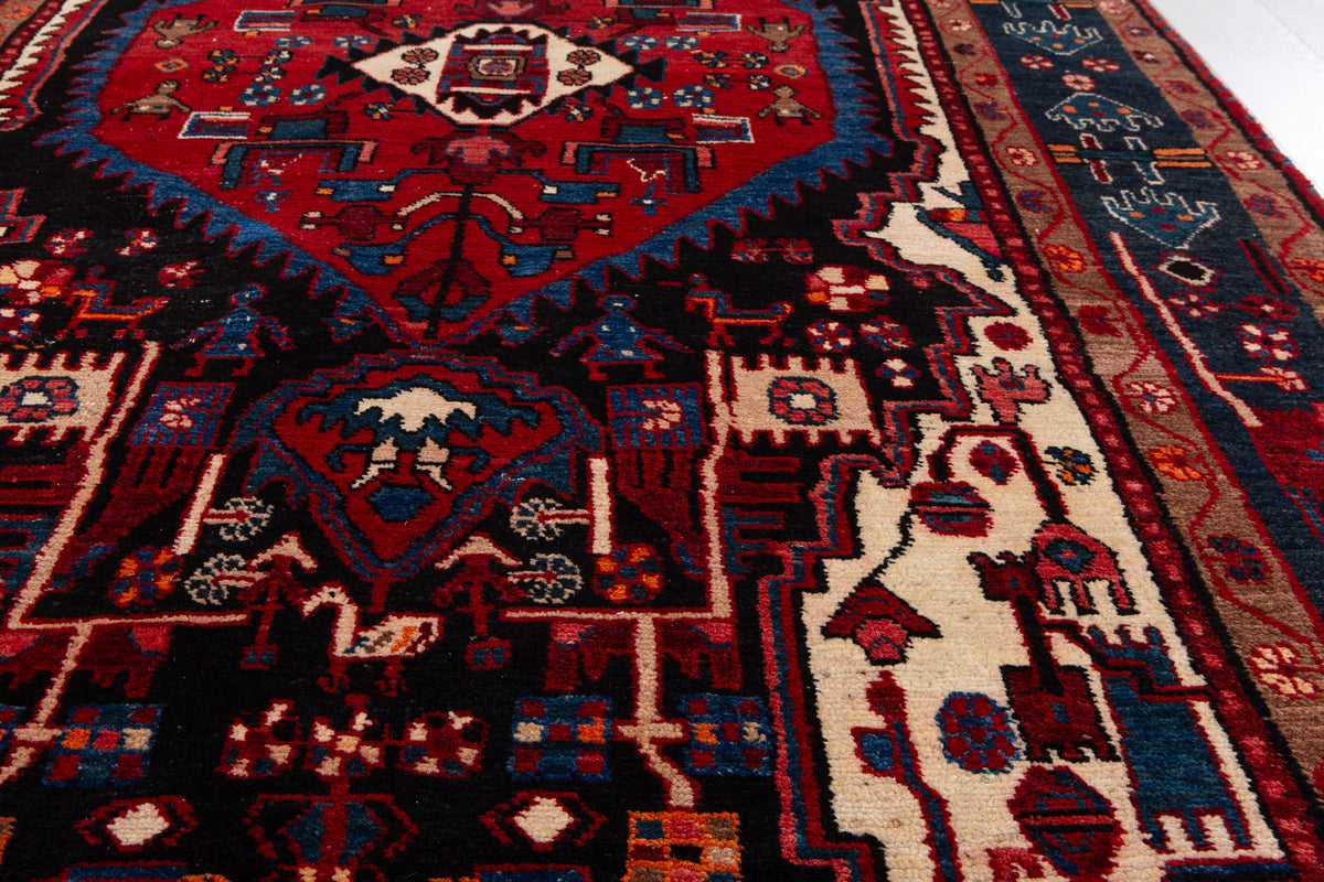Antique Navy Blue & Red Geometric Medallion Wool Rug – 10' 5" x 5' 3" (317 x 161 cm)