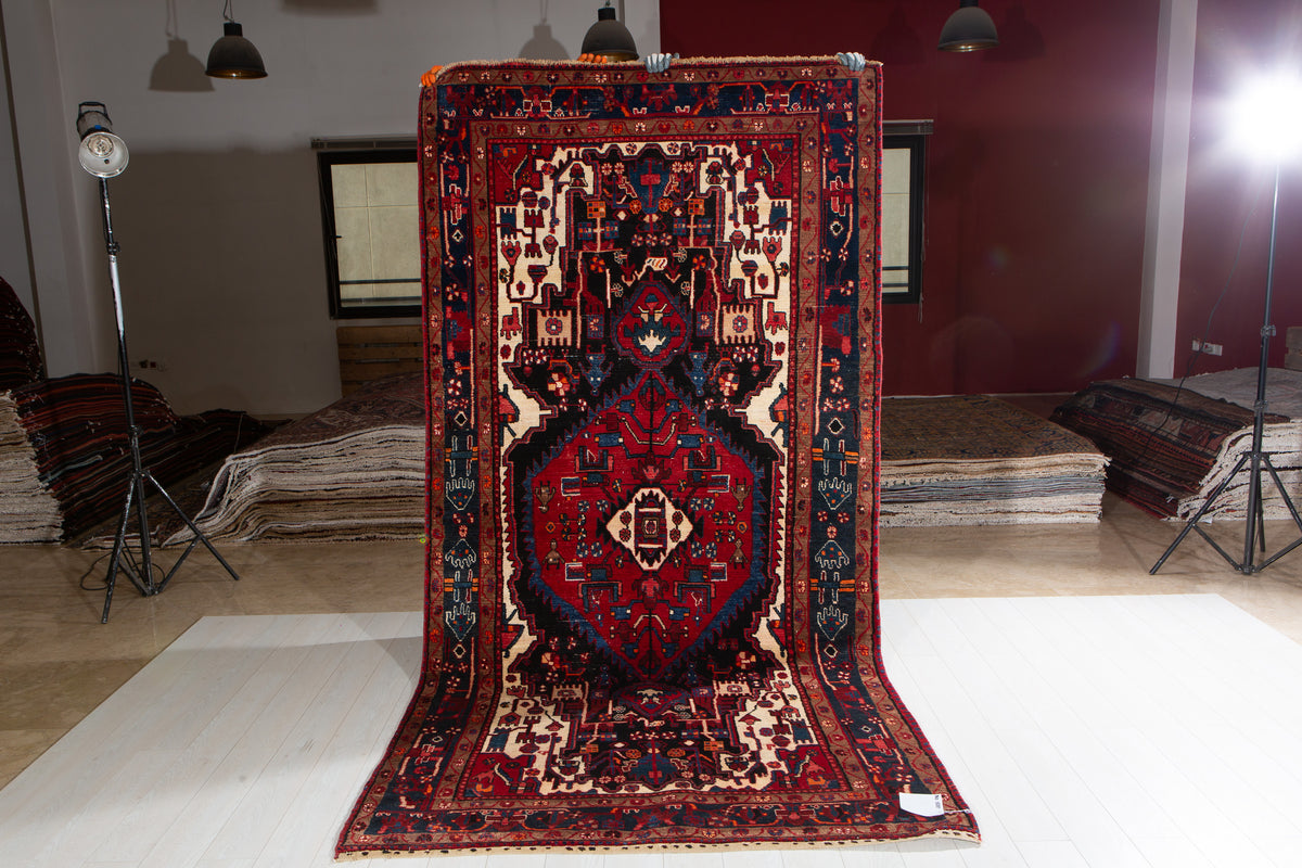 Antique Navy Blue & Red Geometric Medallion Wool Rug – 10' 5" x 5' 3" (317 x 161 cm)