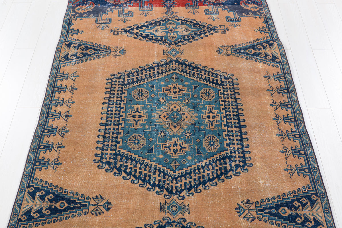 Collectible Antique Muted Orange & Blue Geometric Medallion Wool Rug – 9' 7" x 5' 1" (291 x 155 cm)