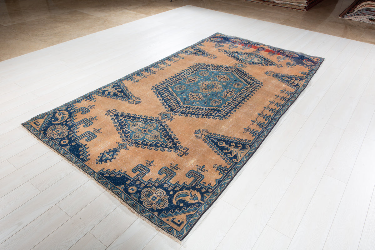 Collectible Antique Muted Orange & Blue Geometric Medallion Wool Rug – 9' 7" x 5' 1" (291 x 155 cm)