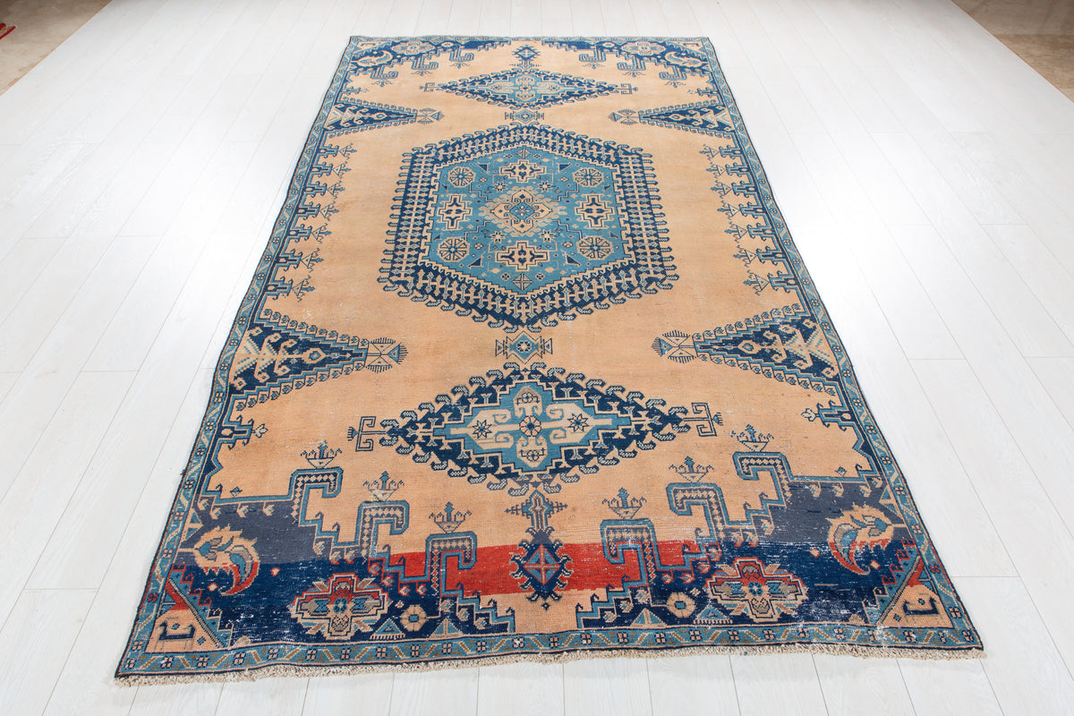 Collectible Antique Muted Orange & Blue Geometric Medallion Wool Rug – 9' 7" x 5' 1" (291 x 155 cm)