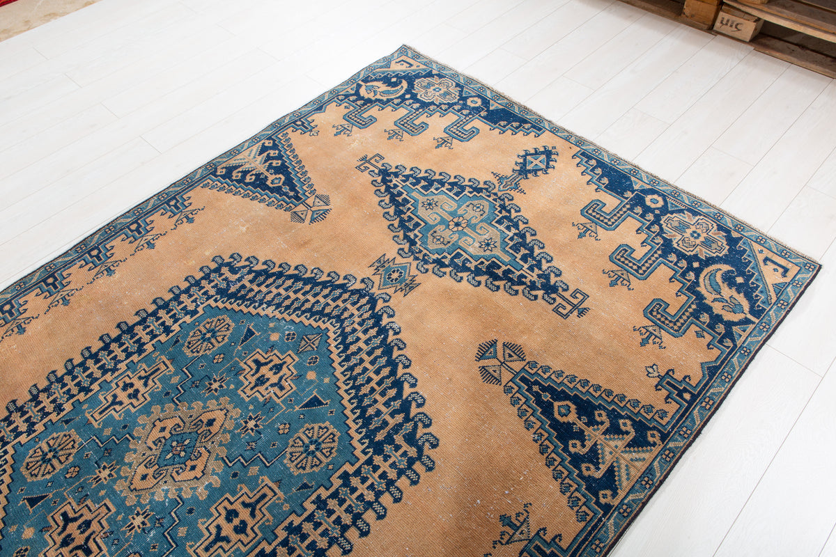 Collectible Antique Muted Orange & Blue Geometric Medallion Wool Rug – 9' 7" x 5' 1" (291 x 155 cm)