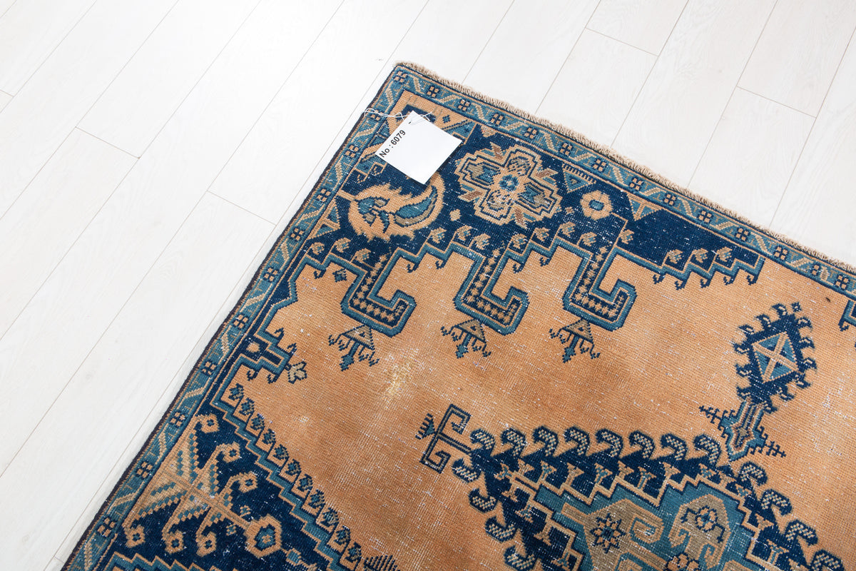 Collectible Antique Muted Orange & Blue Geometric Medallion Wool Rug – 9' 7" x 5' 1" (291 x 155 cm)