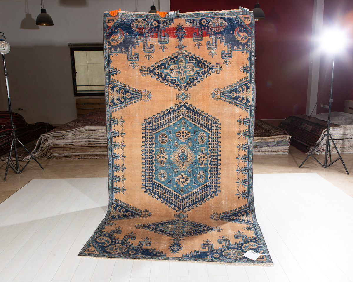 Collectible Antique Muted Orange & Blue Geometric Medallion Wool Rug – 9' 7" x 5' 1" (291 x 155 cm)
