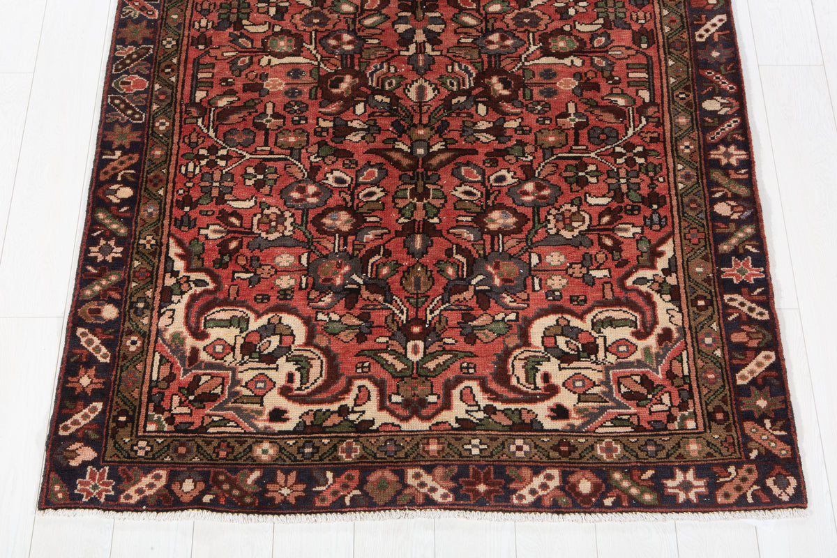 Vintage Red Hand-Knotted Wool Rug – 10' 5" x 4' 7" (318 x 139 cm)