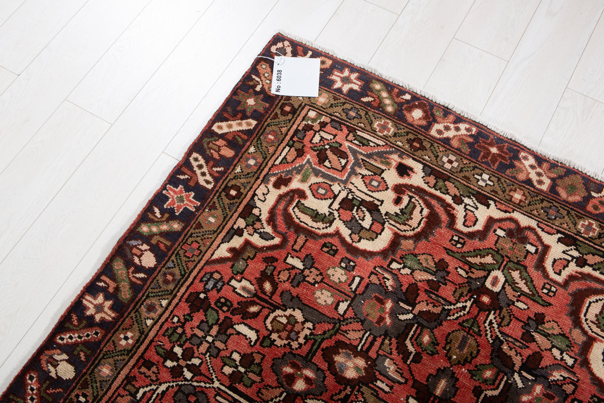 Vintage Red Hand-Knotted Wool Rug – 10' 5" x 4' 7" (318 x 139 cm)
