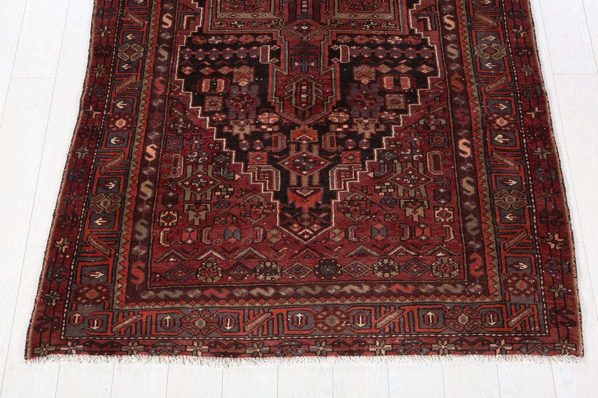Vintage Red & Black Hand-Knotted Wool Rug – 9' 4" x 4' 10" (285 x 148 cm)