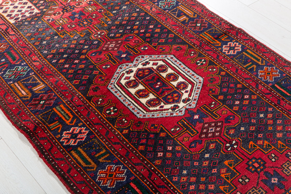 Vintage Navy Blue & Red Hand-Knotted Wool Rug – 7' 3" x 3' 6" (221 x 107 cm)