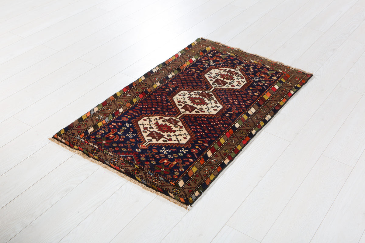 Small Vintage Navy Blue & Brown Rug – 4' 1" x 2' 5" (125 x 74 cm)