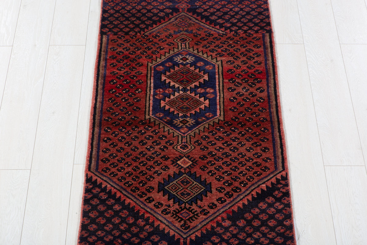 Small Vintage Rust Red & Navy Blue Rug – 4' 11" x 2' 4" (149 x 70 cm)
