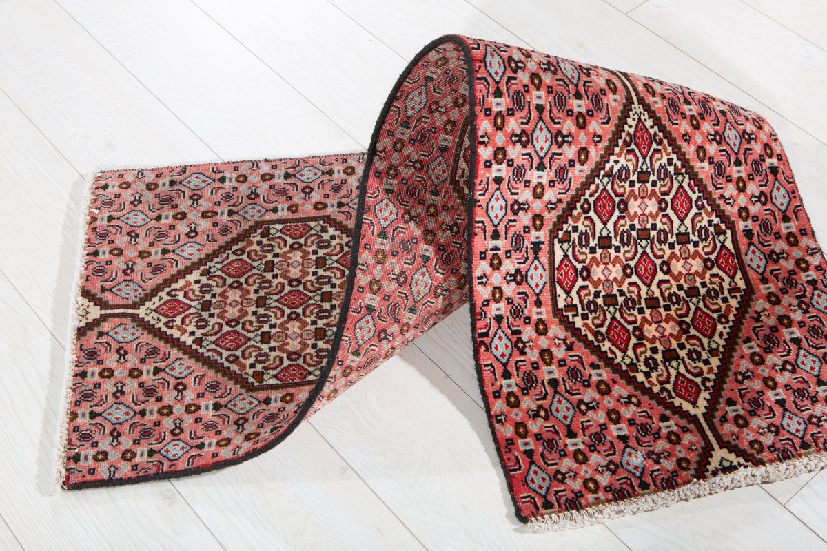 Small Antique Coral Pink Rug – 4' 1" x 1' 5" (124 x 43 cm)