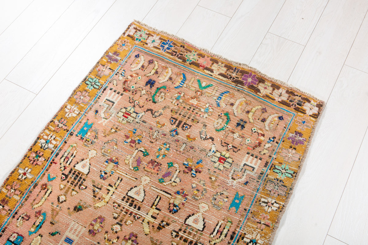 Small Antique Faded Pink Peach Rug – 5' 7" x 2' 7" (169 x 78 cm)