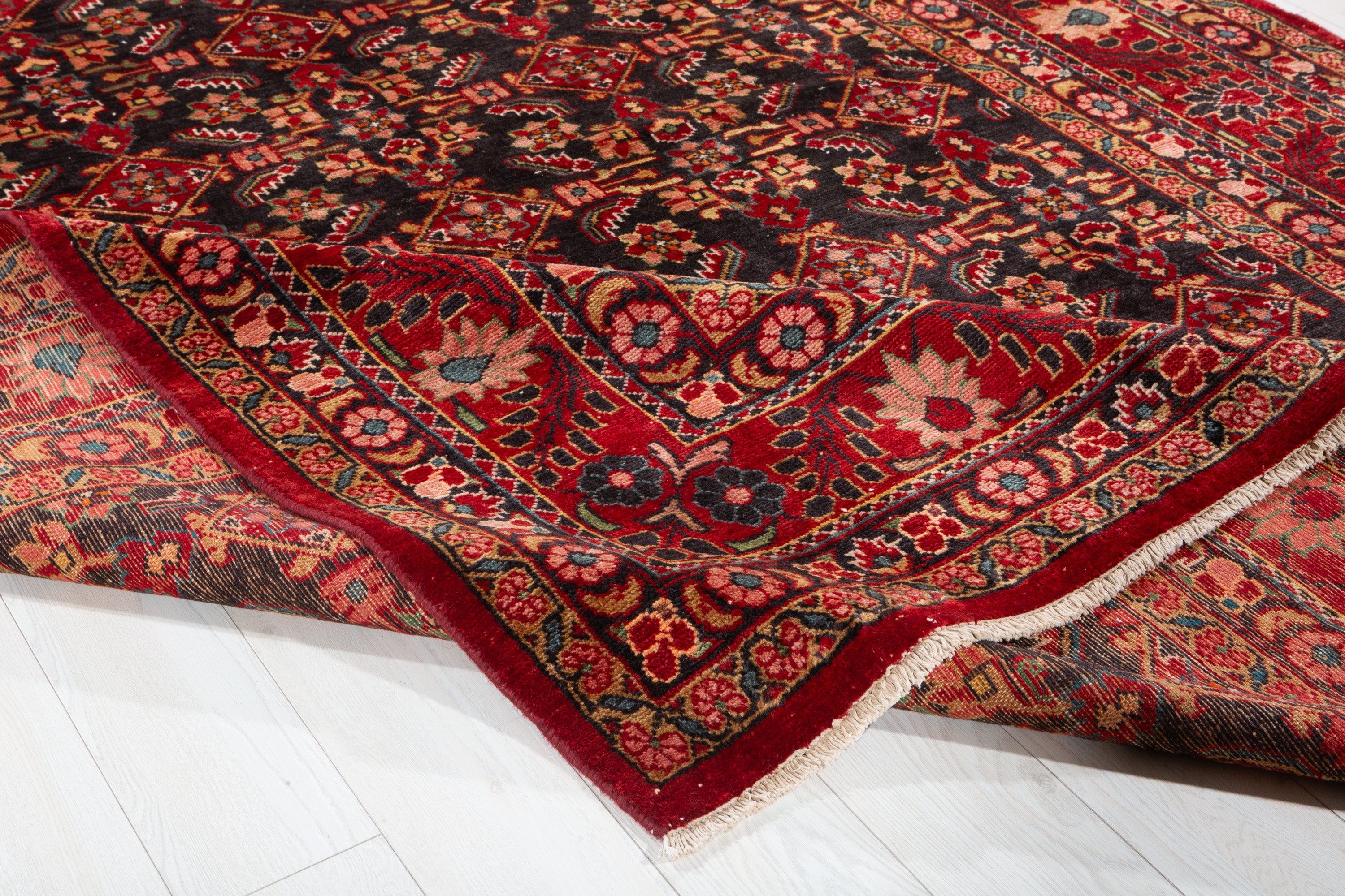 Collectible Vintage Dark navy and red Traditional Rug – 10' 1" x 7' 4" (307 x 224 cm)