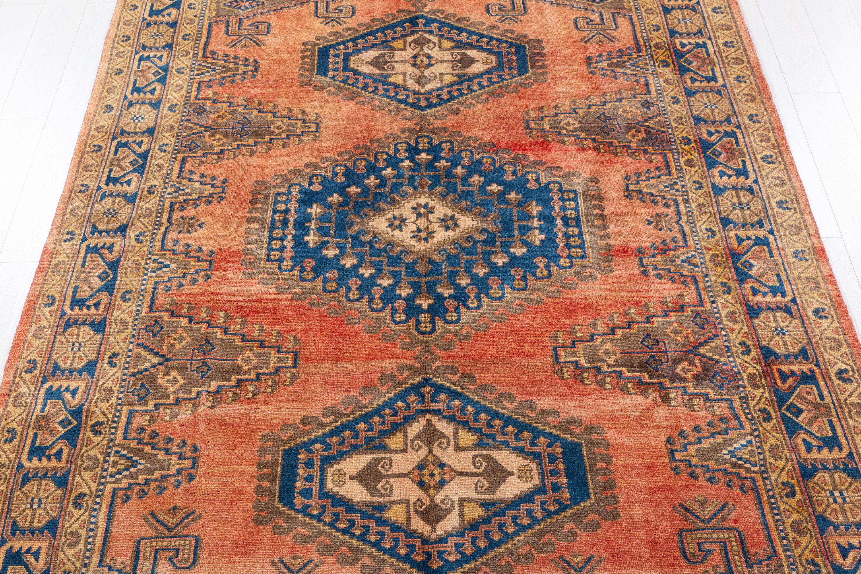 Collectible Vintage Faded orange-red and navy Geometric Rug – 9' 11" x 6' 7" (302 x 200 cm)