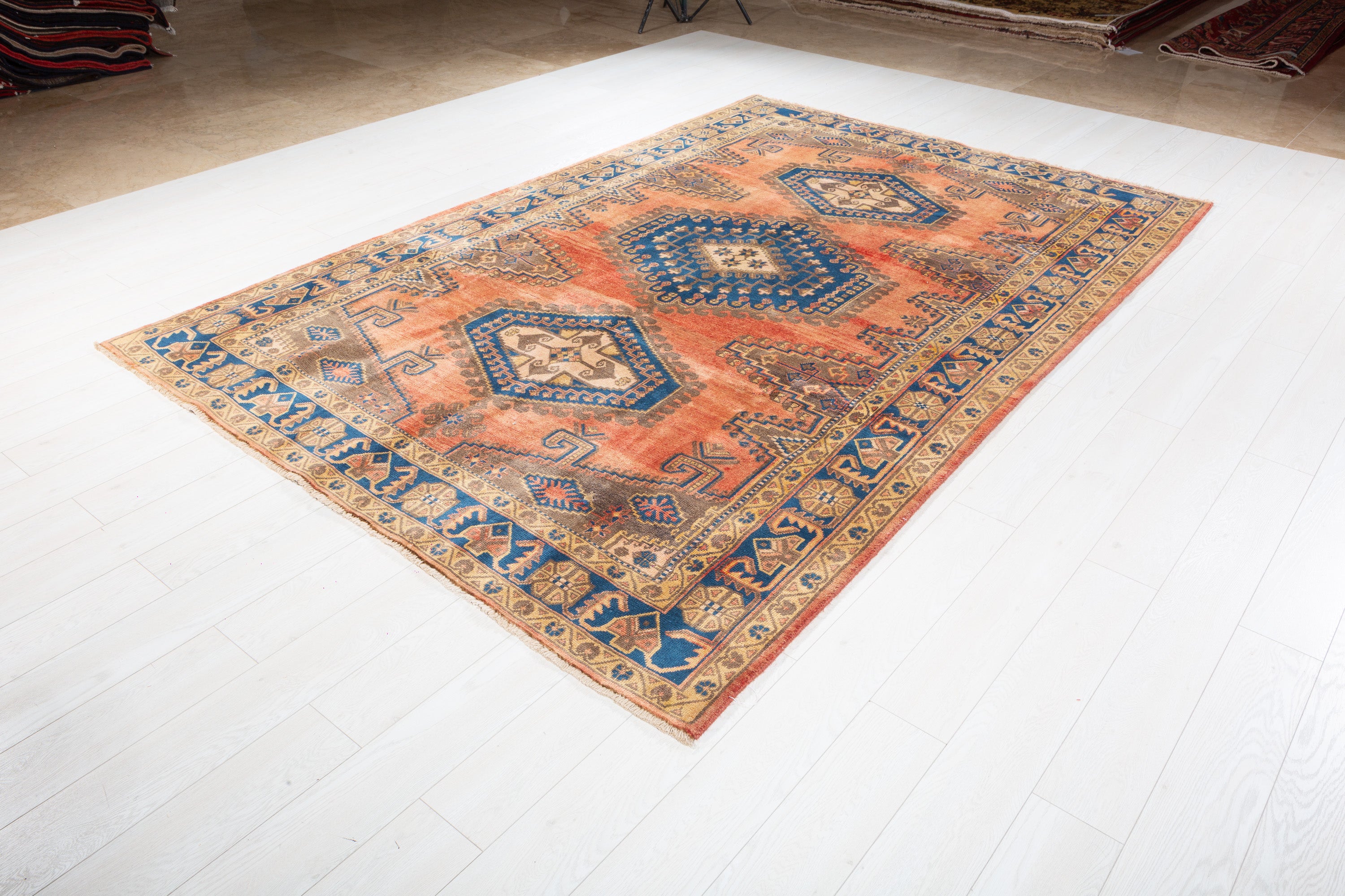 Collectible Vintage Faded orange-red and navy Geometric Rug – 9' 11" x 6' 7" (302 x 200 cm)