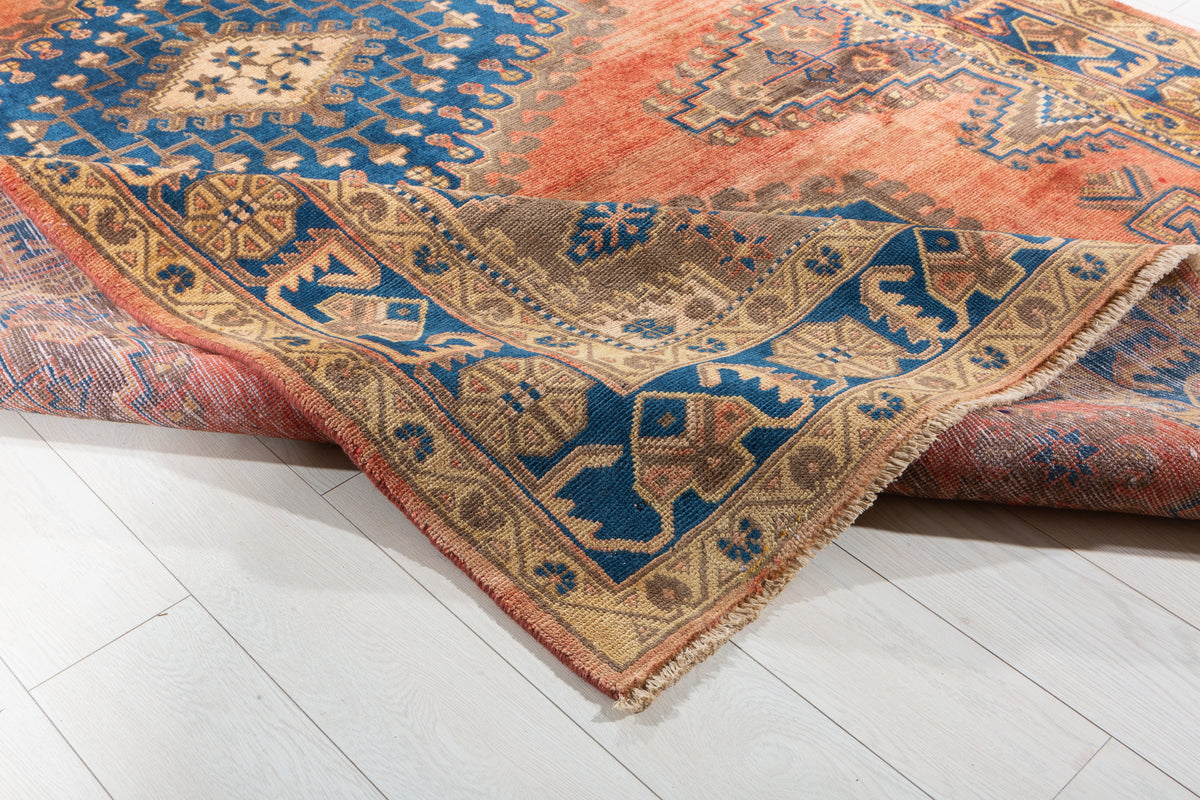 Collectible Vintage Faded orange-red and navy Geometric Rug – 9' 11" x 6' 7" (302 x 200 cm)