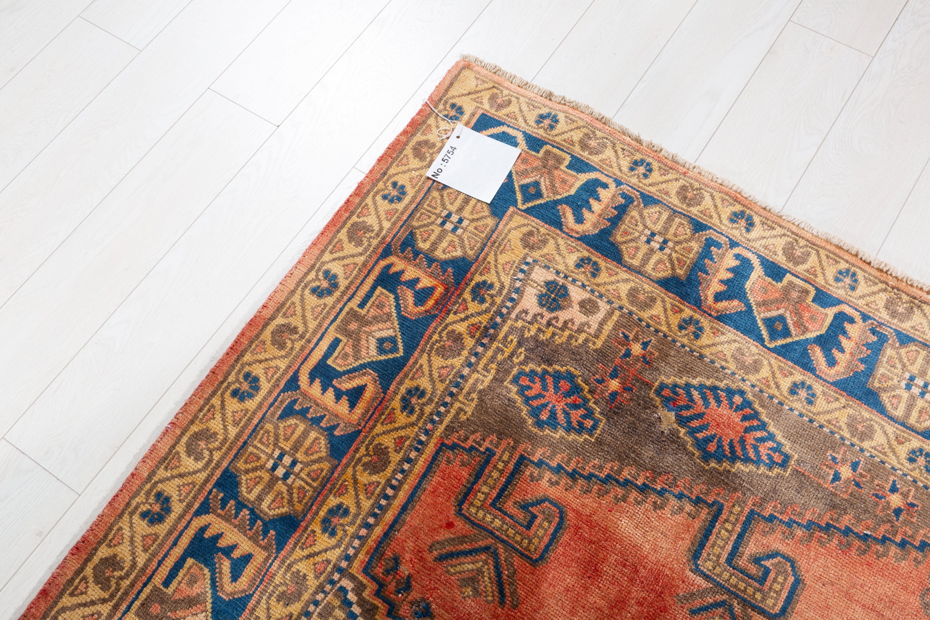 Collectible Vintage Faded orange-red and navy Geometric Rug – 9' 11" x 6' 7" (302 x 200 cm)