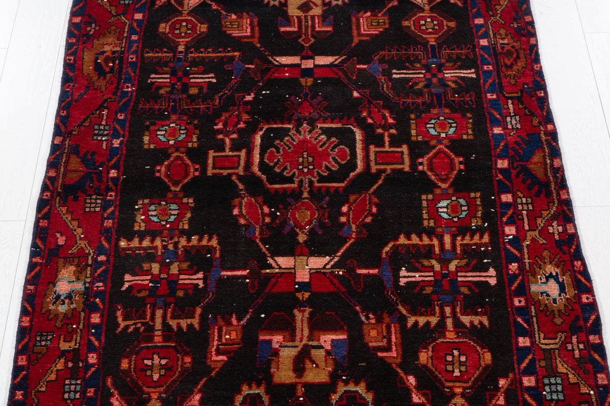 Collectible Vintage Black Red Animal Motif Area Rug – 6' 4" x 4' 3" (194 x 130 cm)