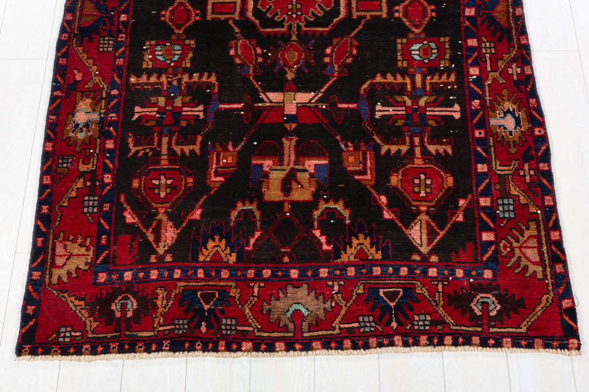Collectible Vintage Black Red Animal Motif Area Rug – 6' 4" x 4' 3" (194 x 130 cm)