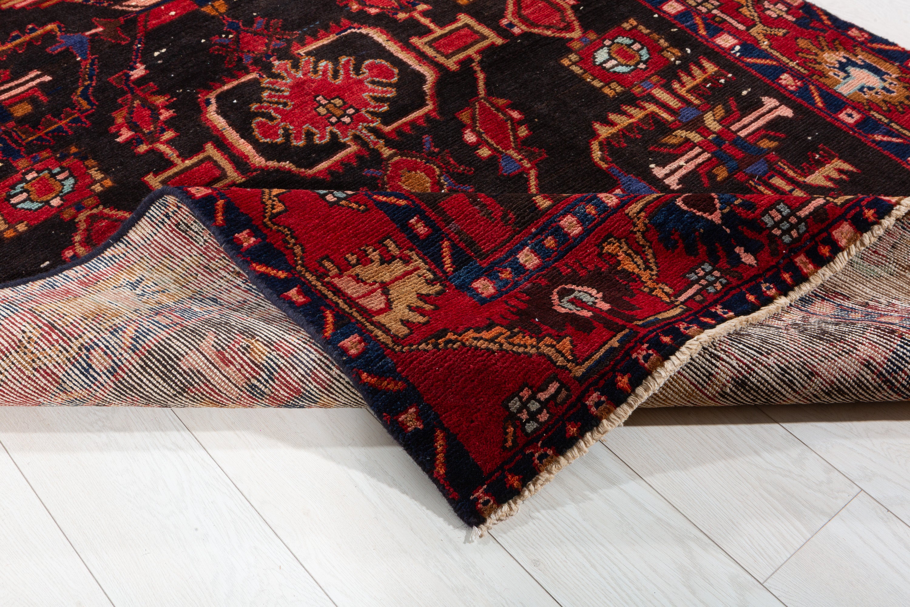 Collectible Vintage Black Red Animal Motif Area Rug – 6' 4" x 4' 3" (194 x 130 cm)