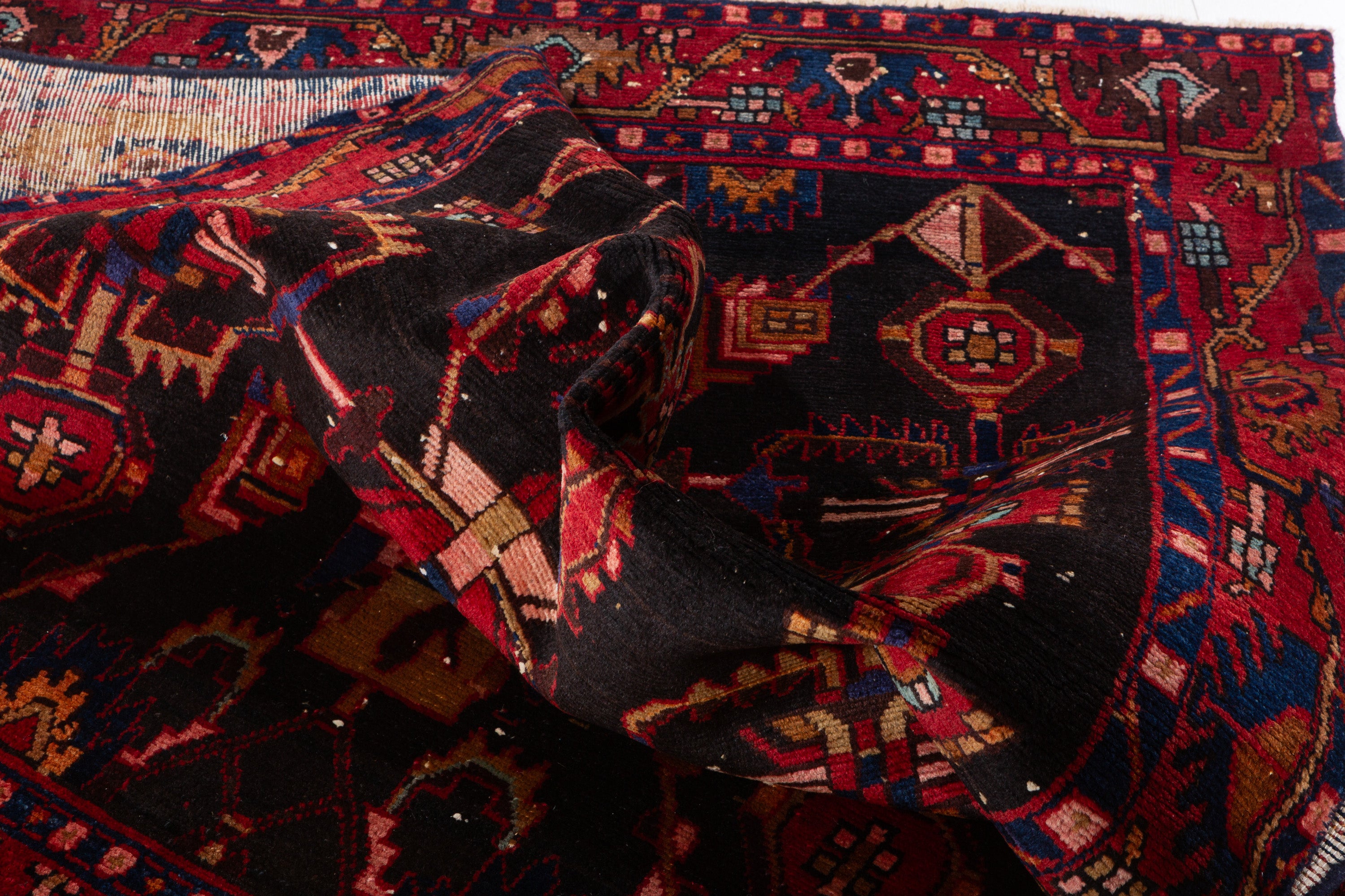 Collectible Vintage Black Red Animal Motif Area Rug – 6' 4" x 4' 3" (194 x 130 cm)