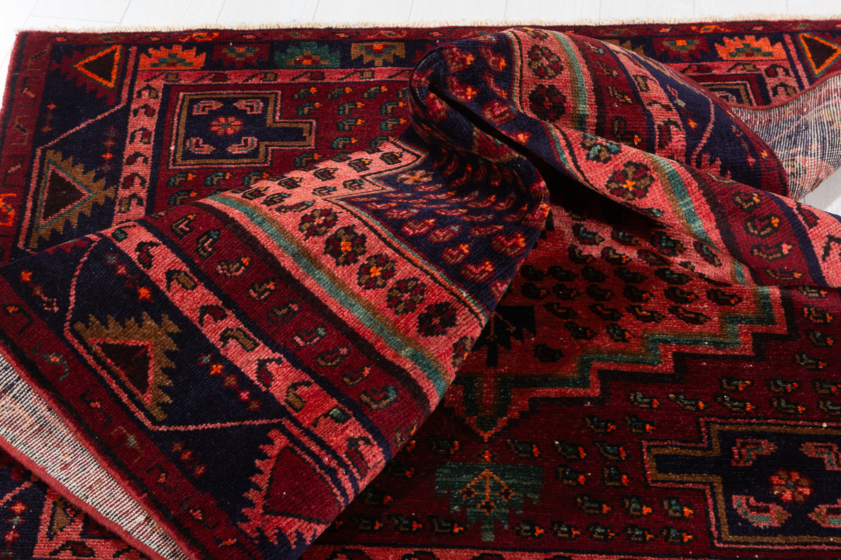 Collectible Vintage Maroon & Pink Geometric Area Rug – 6' 9" x 4' 5" (207 x 134 cm)