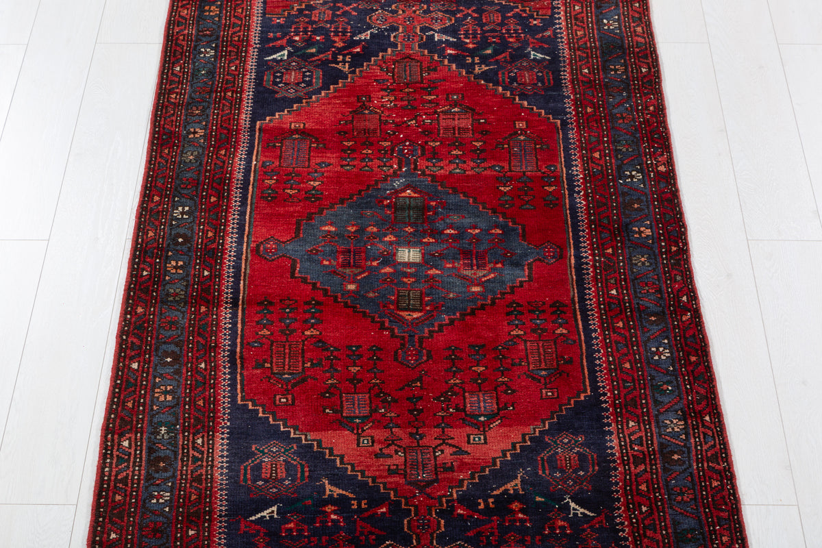 Vintage Red and Navy Blue Elongated Medallion Hand-Knotted Area Rug – 6' 8" x 3' 5" (204 x 104 cm)