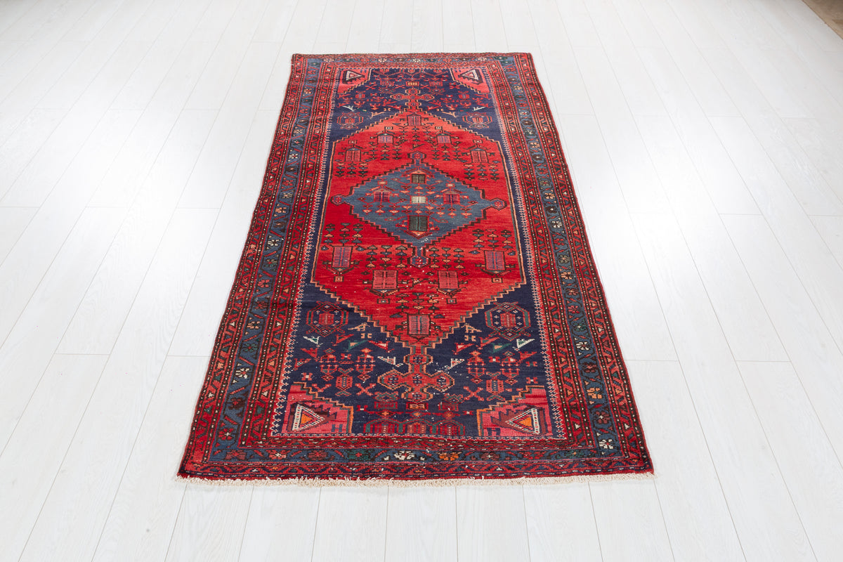 Vintage Red and Navy Blue Elongated Medallion Hand-Knotted Area Rug – 6' 8" x 3' 5" (204 x 104 cm)