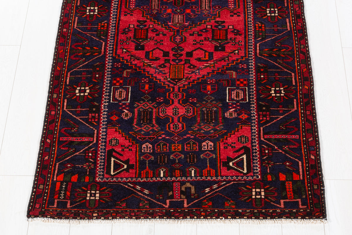 Tapis vintage rouge et bleu marine à médaillon géométrique – 6' 9" x 3' 4" (206 x 102 cm)