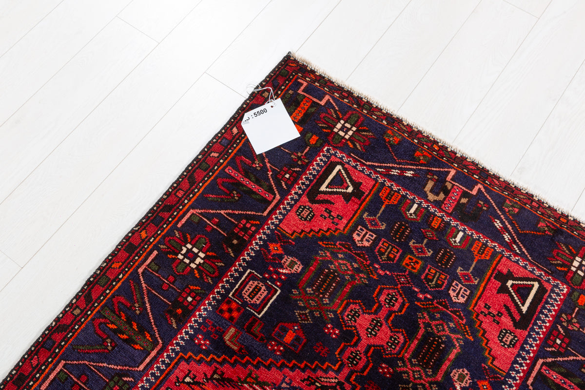 Tapis vintage rouge et bleu marine à médaillon géométrique – 6' 9" x 3' 4" (206 x 102 cm)