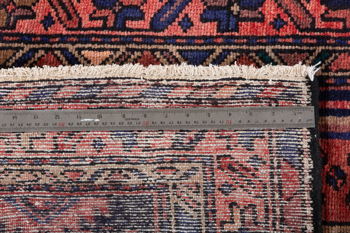 Tapis vintage rouge rouille et bleu marine à médaillon losangé – 6' 7" x 3' 3" (201 x 100 cm)