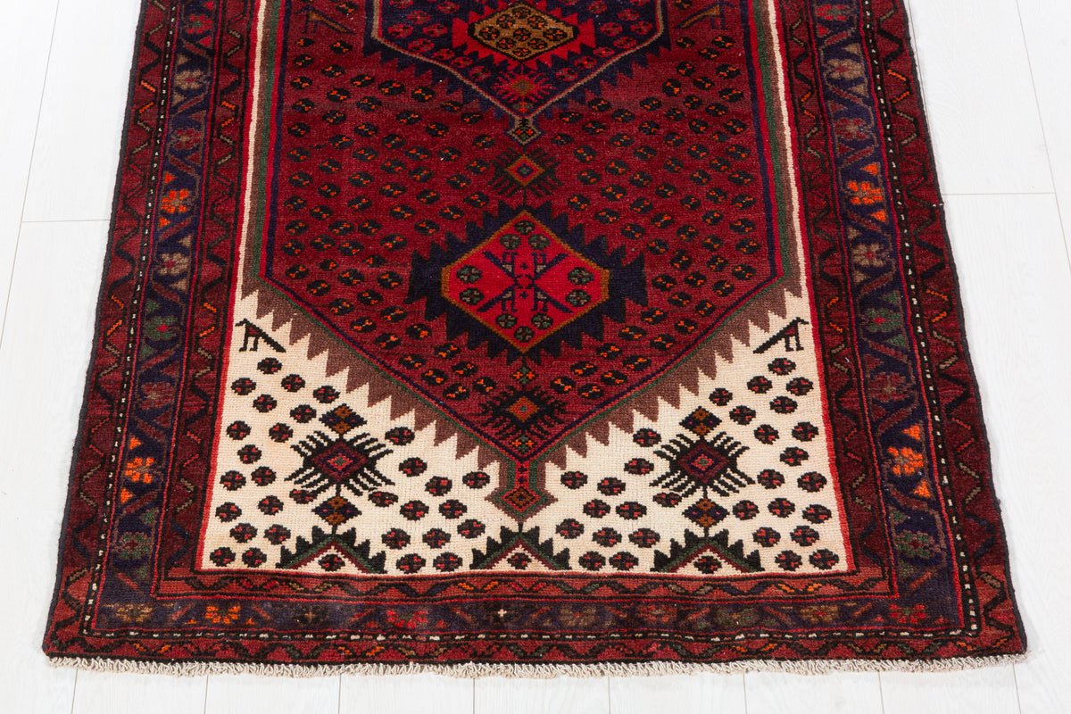 Tapis vintage rouge rouille et bleu marine à médaillon losangé – 6' 6" x 3' 5" (198 x 104 cm)