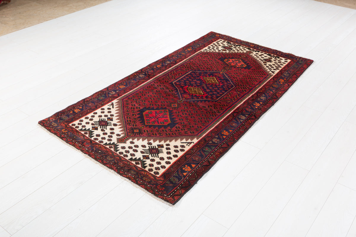Tapis vintage rouge rouille et bleu marine à médaillon losangé – 6' 6" x 3' 5" (198 x 104 cm)