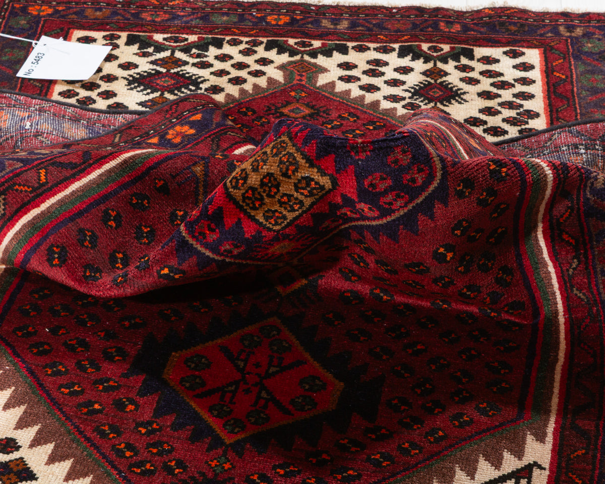 Tapis vintage rouge rouille et bleu marine à médaillon losangé – 6' 6" x 3' 5" (198 x 104 cm)