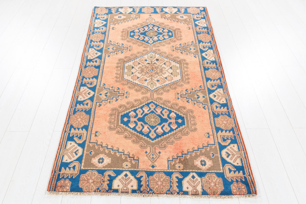Collectible Vintage Faded Peach and Blue Triple Diamond Medallion Hand-Knotted Area Rug – 6' 6" x 3' 7" (199 x 108 cm)