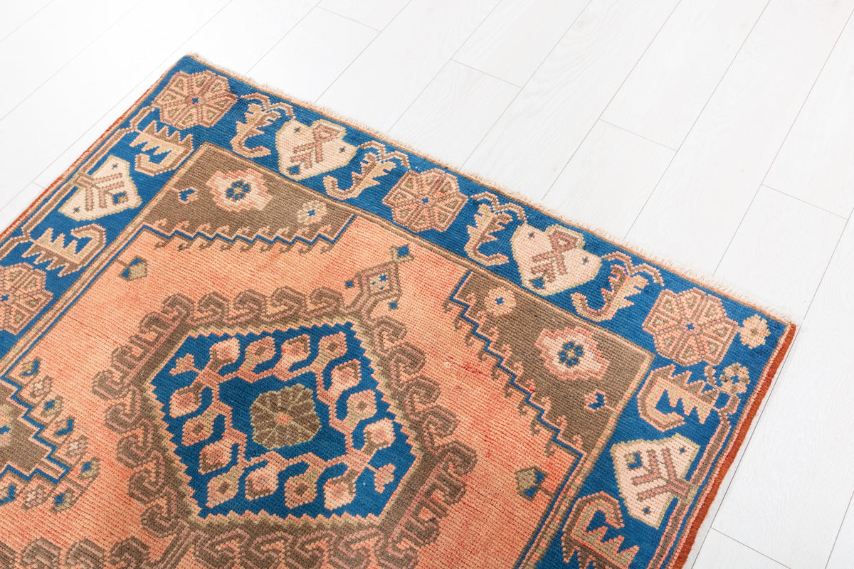 Collectible Vintage Faded Peach and Blue Triple Diamond Medallion Hand-Knotted Area Rug – 6' 6" x 3' 7" (199 x 108 cm)