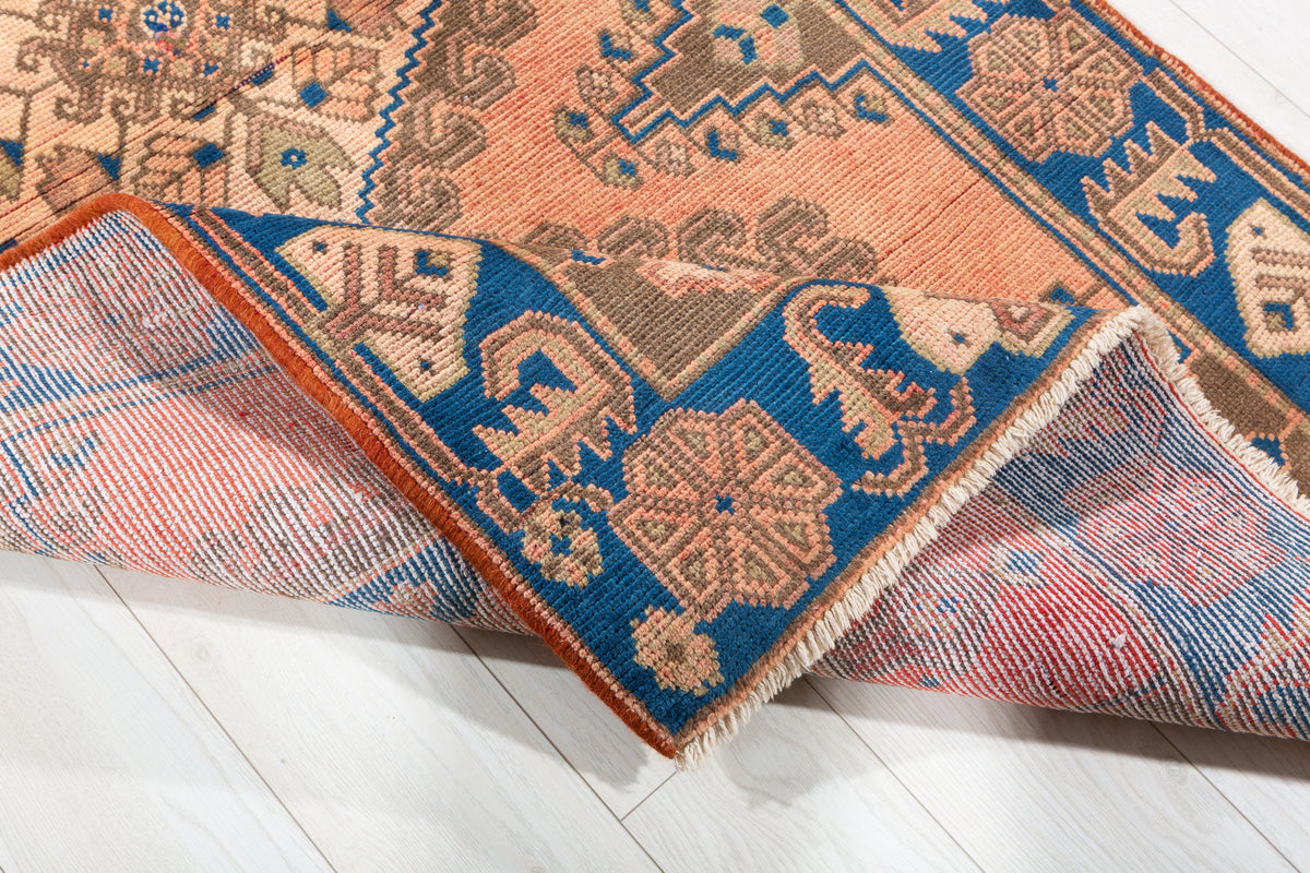 Collectible Vintage Faded Peach and Blue Triple Diamond Medallion Hand-Knotted Area Rug – 6' 6" x 3' 7" (199 x 108 cm)
