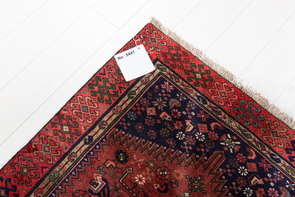 Tapis vintage rouge rouille et bleu marine profond à médaillon géométrique allongé – 6' 5" x 3' 2" (195 x 96 cm)