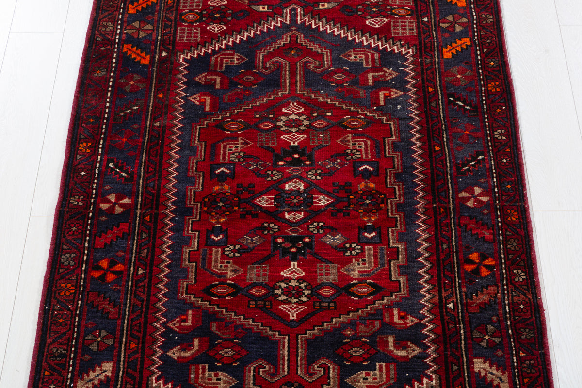 Vintage Red and Faded Navy Blue Geometric Hand-Knotted Area Rug – 6' 11" x 3' 7" (212 x 110 cm)