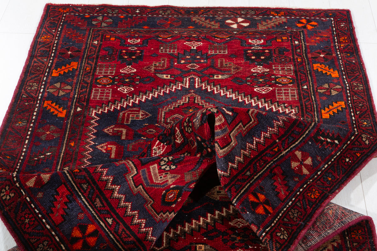 Vintage Red and Faded Navy Blue Geometric Hand-Knotted Area Rug – 6' 11" x 3' 7" (212 x 110 cm)