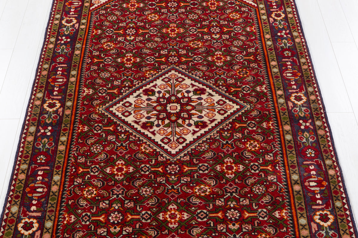 Vintage Red & Beige Wool Rug – 9' 9" x 5' 2" (296 x 157 cm)