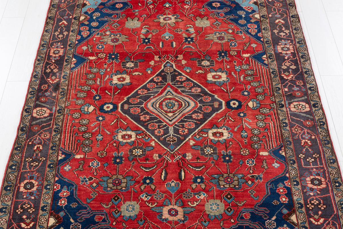 Vintage Red Geometric Medallion Wool Rug – 9' 2" x 5' 2" (279 x 158 cm)