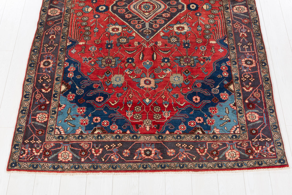 Vintage Red Geometric Medallion Wool Rug – 9' 2" x 5' 2" (279 x 158 cm)