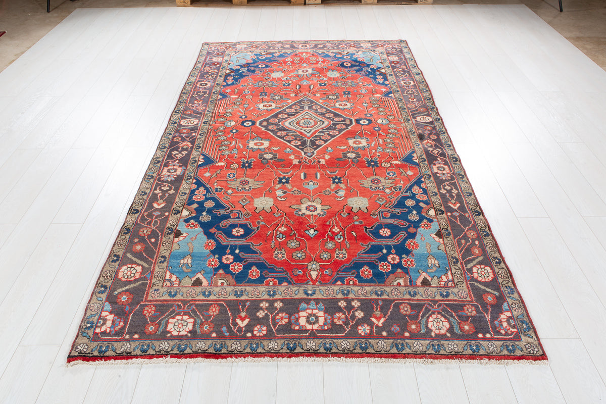 Vintage Red Geometric Medallion Wool Rug – 9' 2" x 5' 2" (279 x 158 cm)