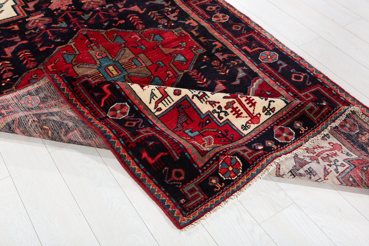 Vintage Deep Navy Blue & Red Geometric Medallion Wool Rug – 8' 6" x 4' 9" (260 x 146 cm)