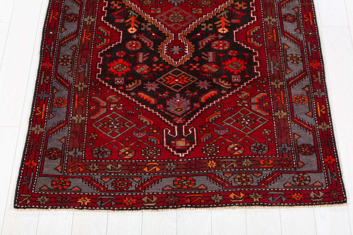 Vintage Black & Red Geometric Medallion Wool Rug – 8' 4" x 4' 7" (255 x 139 cm)
