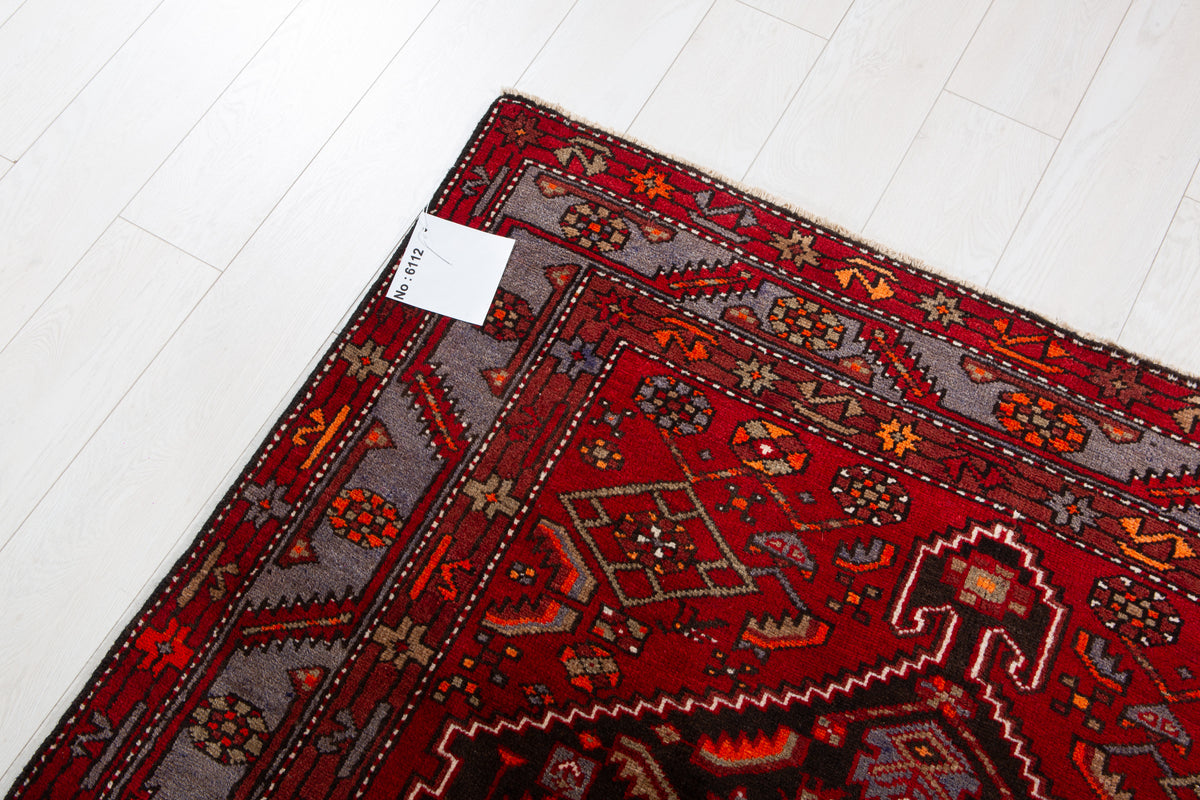 Vintage Black & Red Geometric Medallion Wool Rug – 8' 4" x 4' 7" (255 x 139 cm)