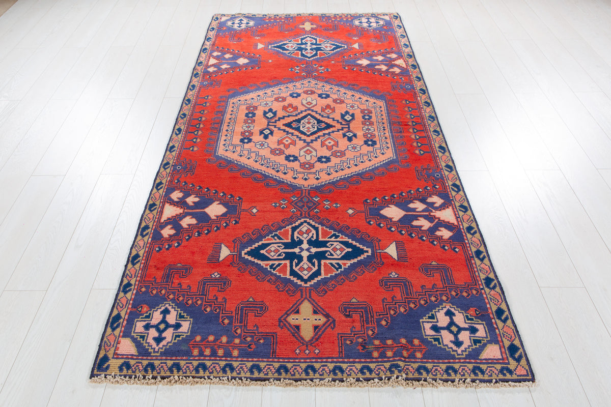 Collectible Vintage Orange Red & Blue Geometric Medallion Wool Rug – 8' 4" x 4' 0" (255 x 123 cm)