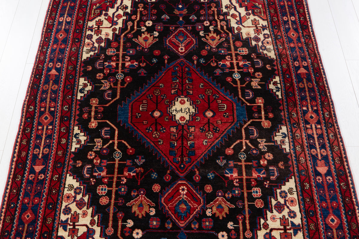 Vintage Black & Red Geometric Medallion Wool Rug – 8' 4" x 5' 2" (254 x 158 cm)